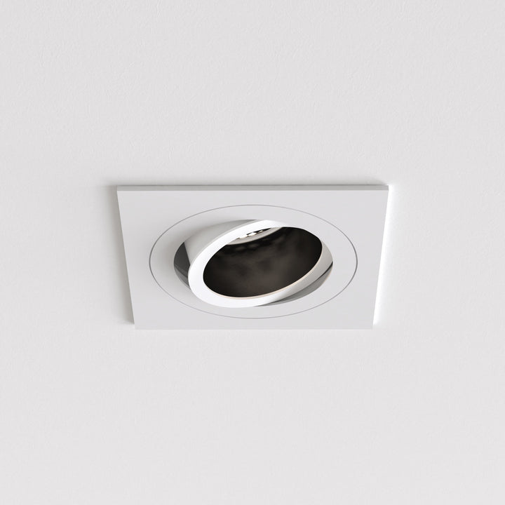 Close-up showing the square trim and adjustable GU10 aperture of the downlight