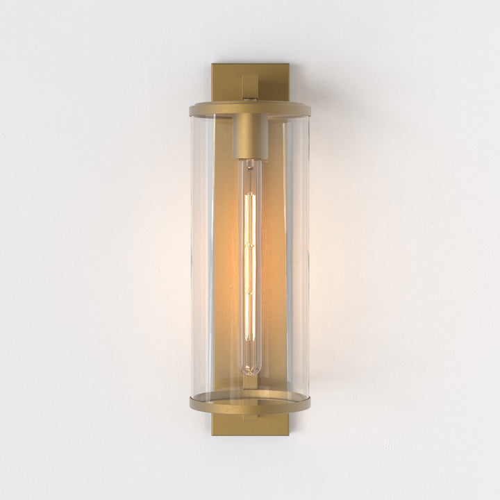 Front view of Astro Pimlico 500 outdoor wall light in Antique Brass with clear glass diffuser