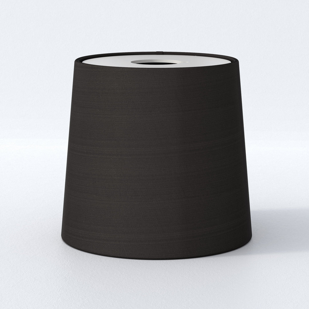 Matt Black Tapered Drum 155 shade, raw fabric texture visible