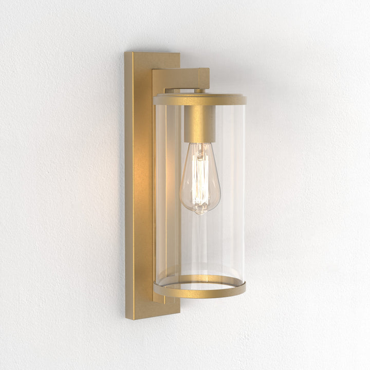 Astro Pimlico 400 wall light in Antique Brass finish mounted on external wall