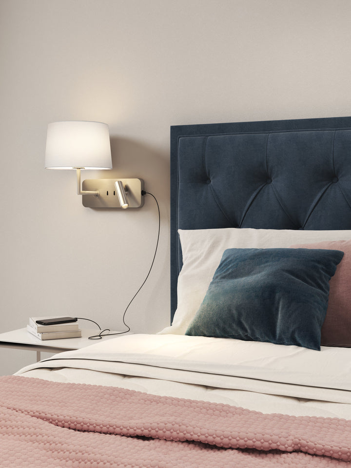 Scaled shot beside a bed showing versatile horizontal mounting and ambient layering