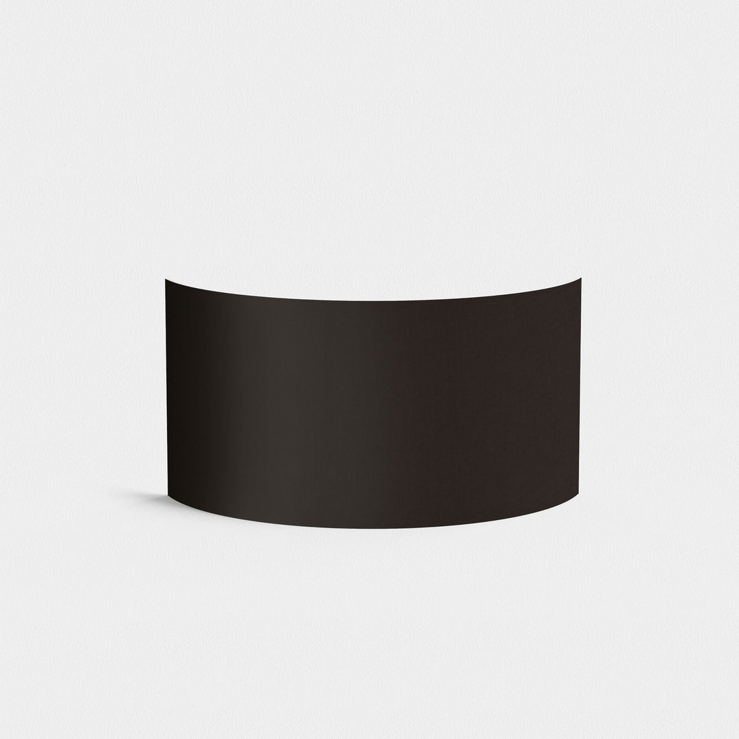 Black Semi Drum 320 mounted on a wall fixture—showing scale and finish