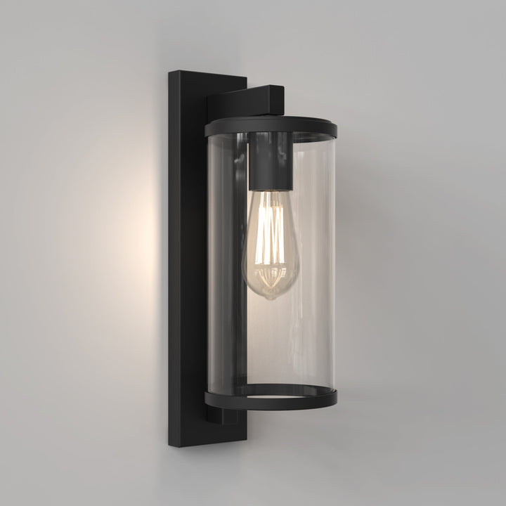 Textured Black Pimlico 400 with clear glass diffuser, softly lit