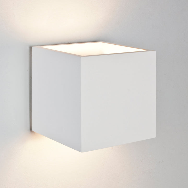 Astro Pienza 165 plaster wall light casting soft up-and-down glow