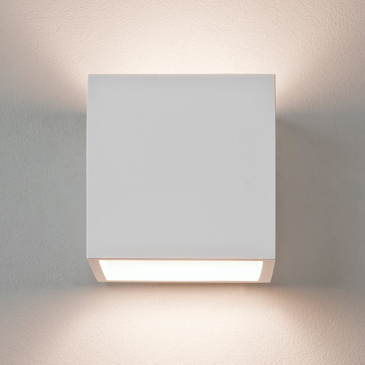 Astro Pienza 140 plaster wall light—soft up and down glow from cube design