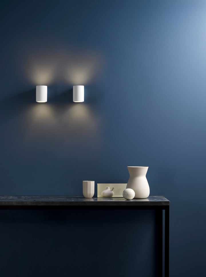 Pair of Pero lights flanking a mirror in a hallway