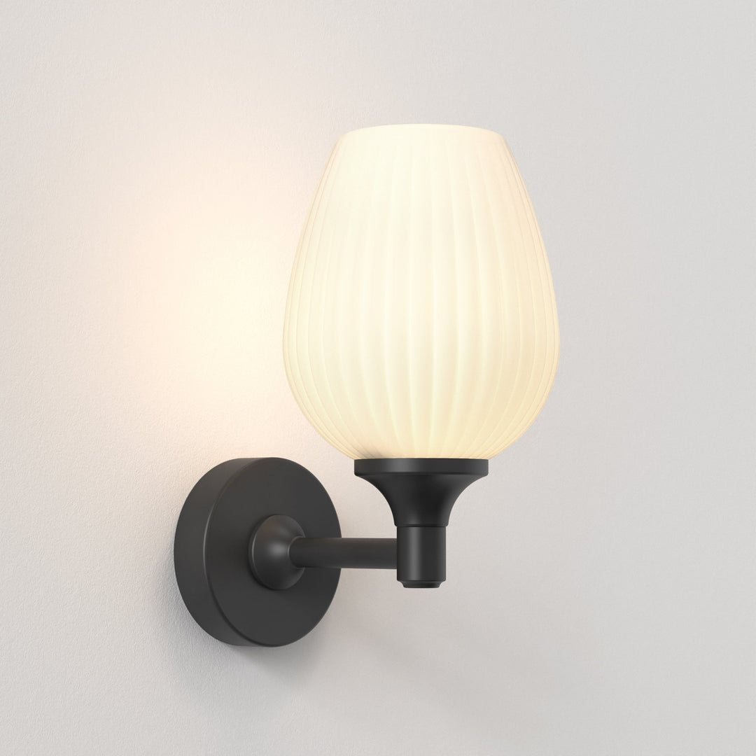 Astro Liberty Wall Light in Matt Black with ribbed glass shade