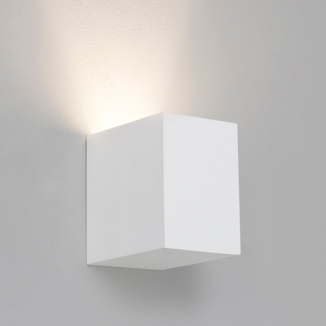 Close-up of Parma 110's plaster finish and cubic form