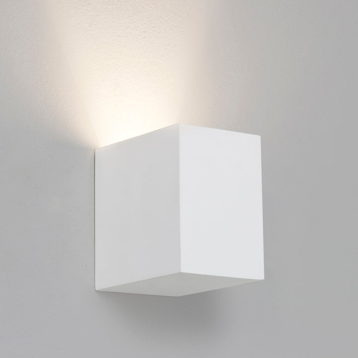 Close-up of Parma 110's plaster finish and cubic form