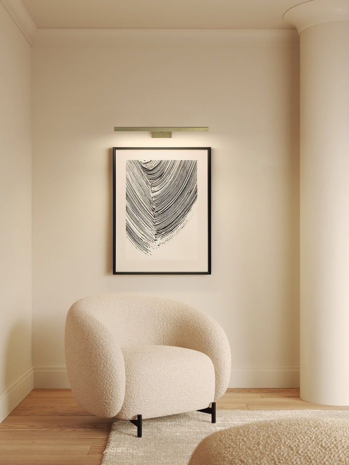 Renoir 680 highlighting artwork with soft, warm illumination