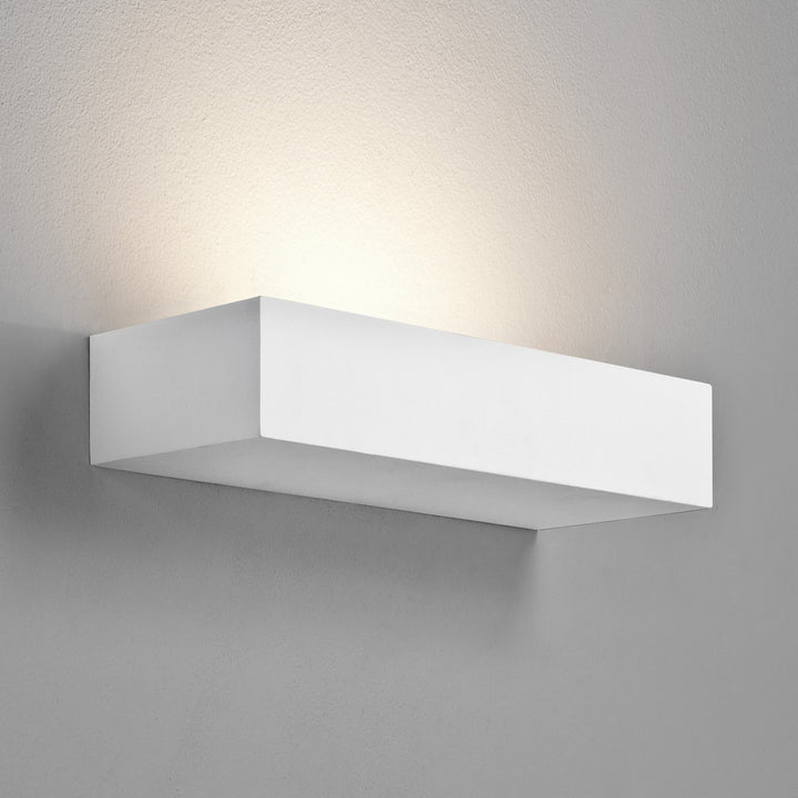 Close-up of Parma 200's rectangular plaster form with light wash above and below