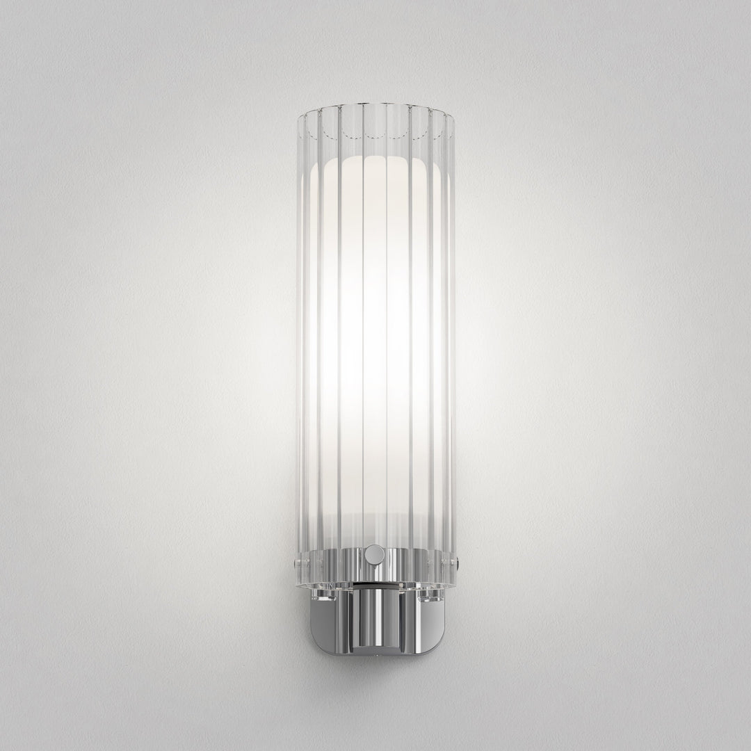 Ottavino wall light mounted solo in a minimalist bathroom setting