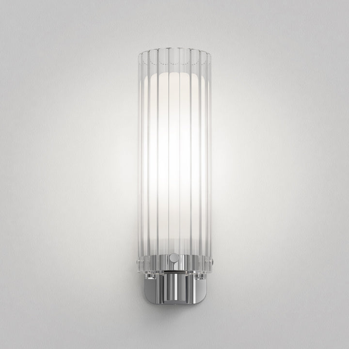 Ottavino wall light mounted solo in a minimalist bathroom setting