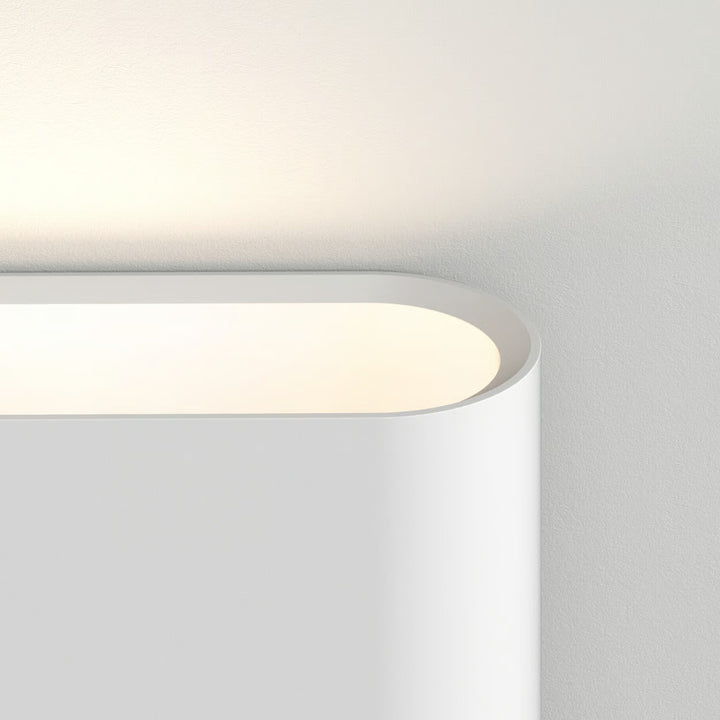 Side profile of Velo 390 showing 100 mm depth and plaster finish