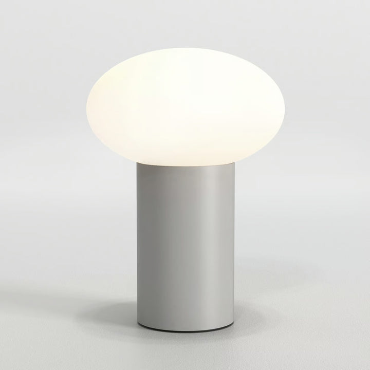 Zeppo lamp with opal glass shade illuminated