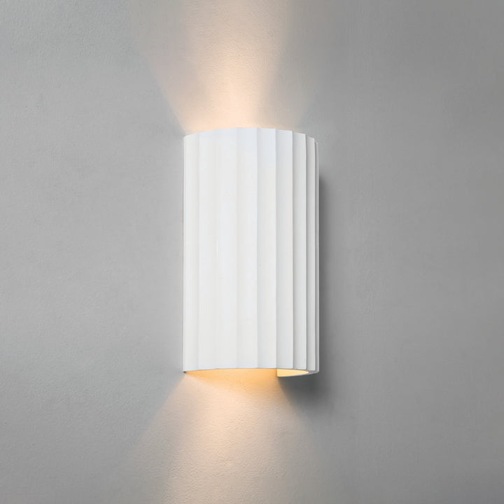 Astro Kymi 220 ribbed plaster wall light — uplight/downlight design