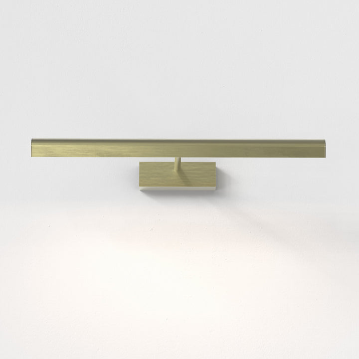 Close-up of tiltable diffuser and sleek brass finish of Renoir 520