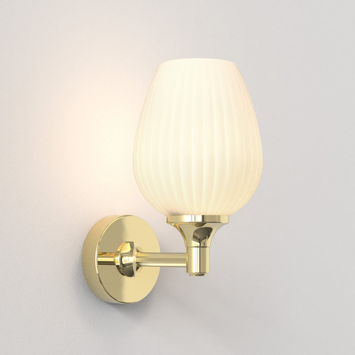 Astro Liberty Wall Light in Polished Brass with ribbed glass shade