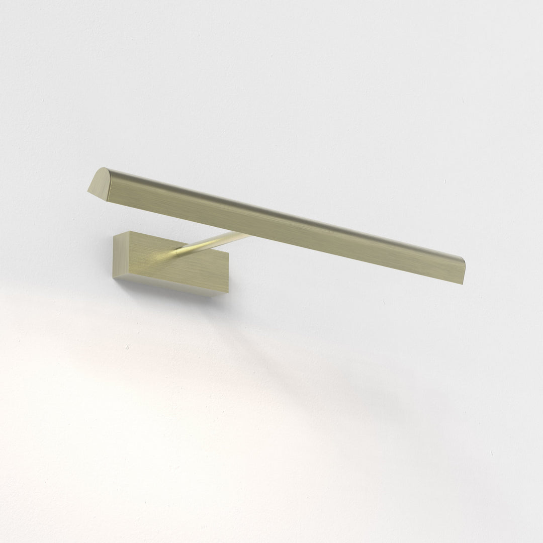 Astro Renoir 520 picture light in Matt Brushed Brass, horizontal wall-mounted