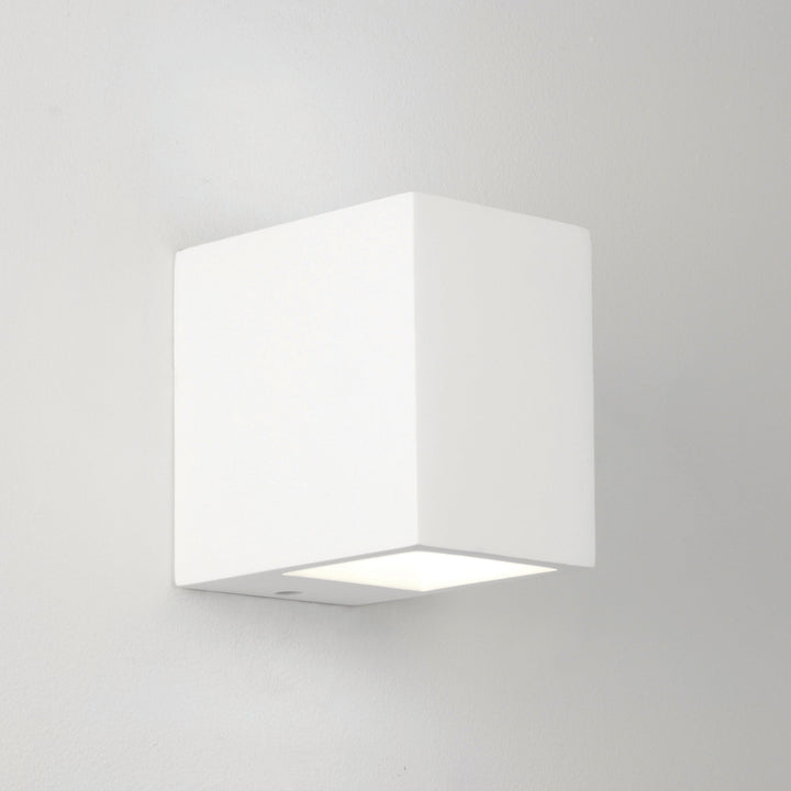 Astro Mosto indoor wall light in white plaster, up/down lighting