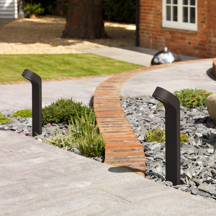 Soprano installed beside a pathway, casting ambient glow to the ground