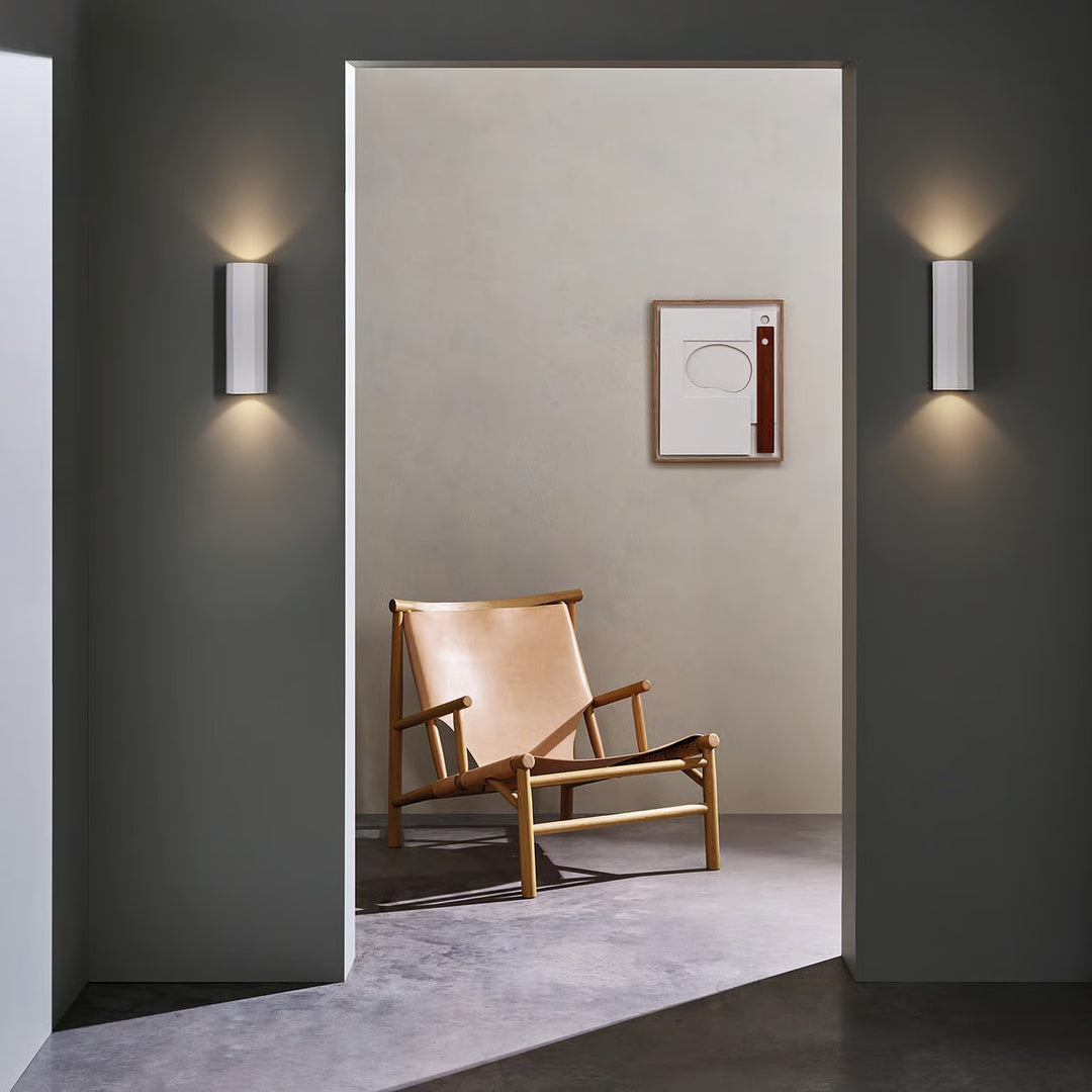 Shadow 300 mounted vertically in a hallway, showing up-and-down light effect