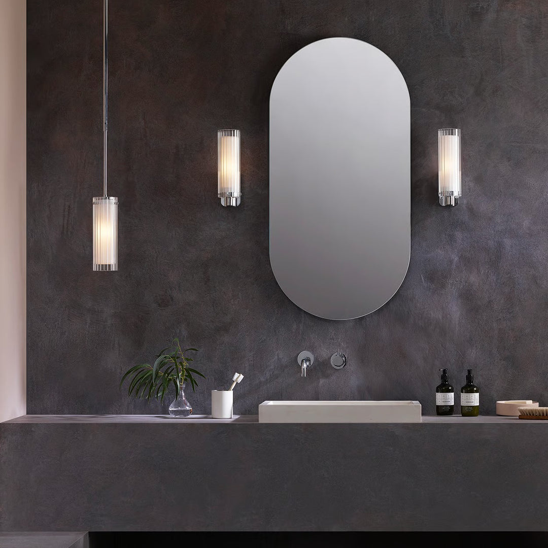 Astro Ottavino pendant suspended beside a bathroom mirror, IP44, E14 LED lamp