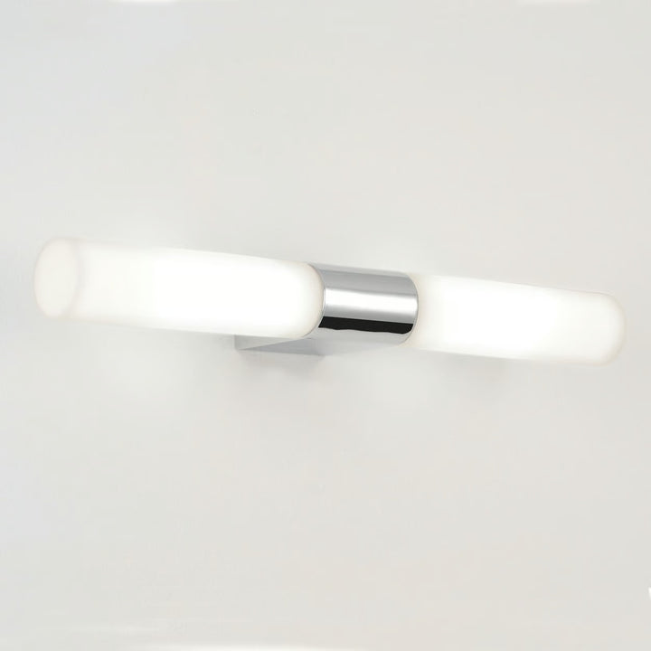 Close-up of Padova's zinc backplate and opaline glass tubes