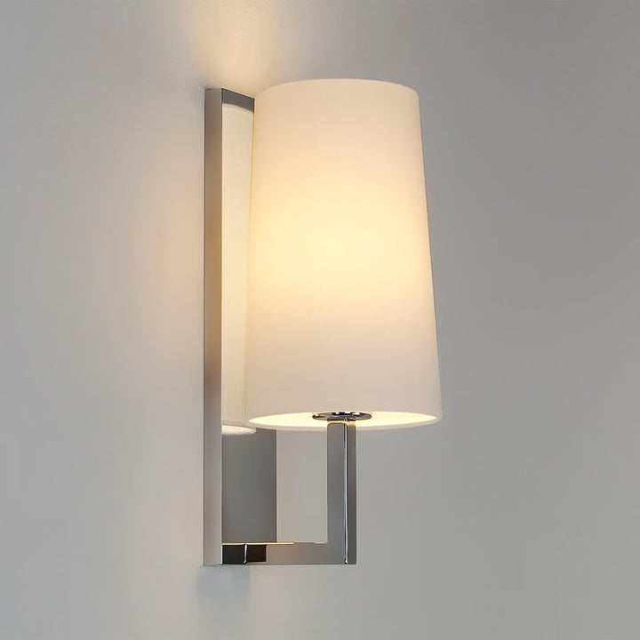 Close-up of tapered Cone shade and sleek linear backplate, Chrome finish
