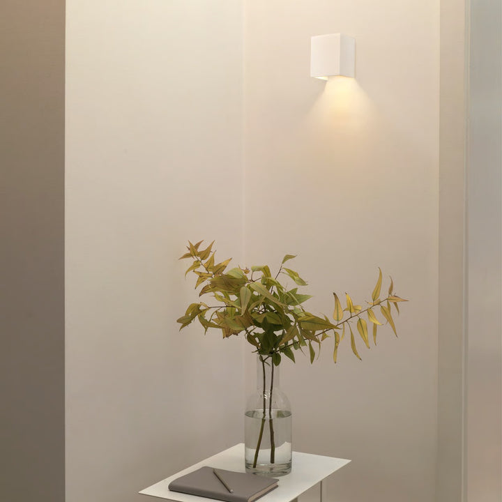 Parma 110 installed in a hallway, highlighting its indirect light wash