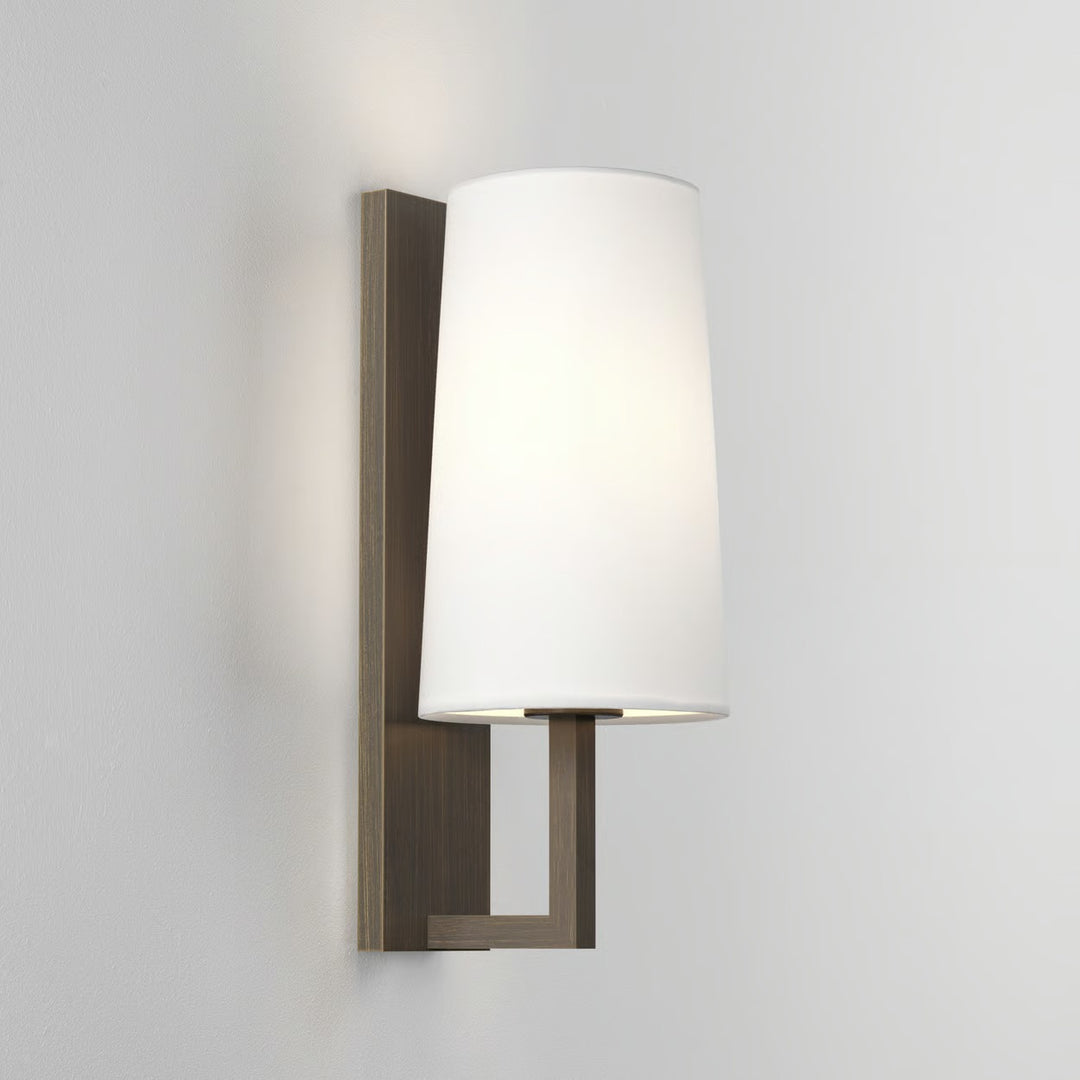 Astro Riva 350 wall light in Bronze, with tapered shade—mounted vertically