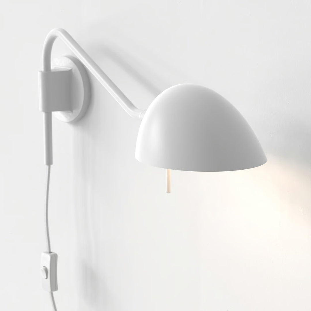 Side profile showing Serge’s projection and wall-mounted plug lead