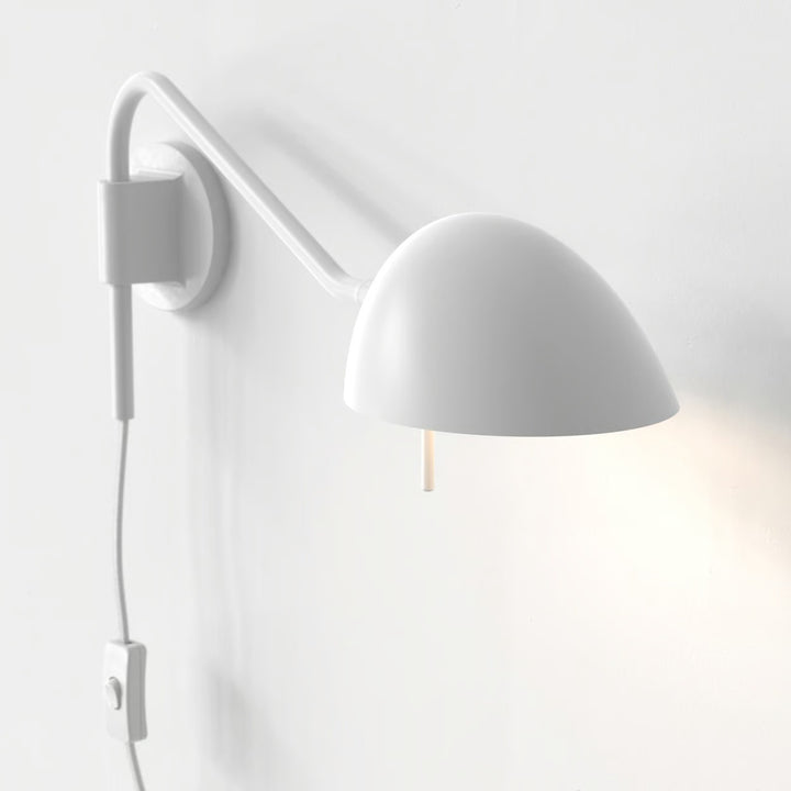 Side profile showing Serge’s projection and wall-mounted plug lead