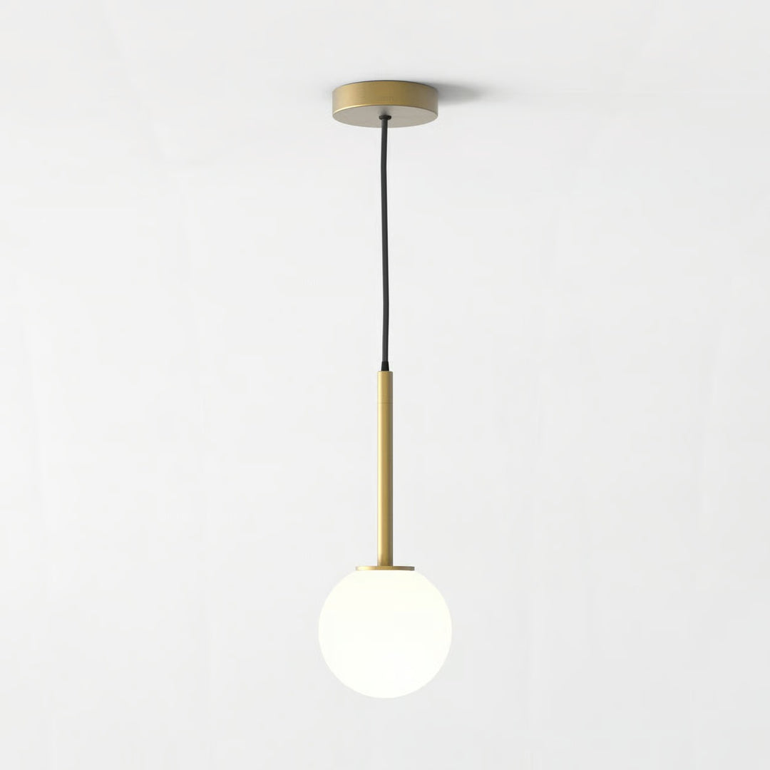 Astro Tacoma Pendant in antique brass, suspended from ceiling with exposed black flex cable
