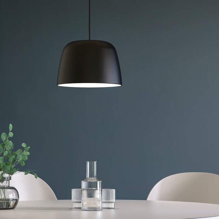 Pendant in situ over dining table, showcasing ambient downward diffusion
