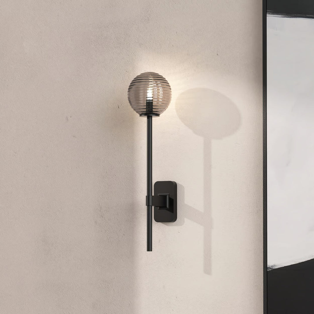 Mounted Tacoma with opaline glass shade illuminating softly within a bathroom setting
