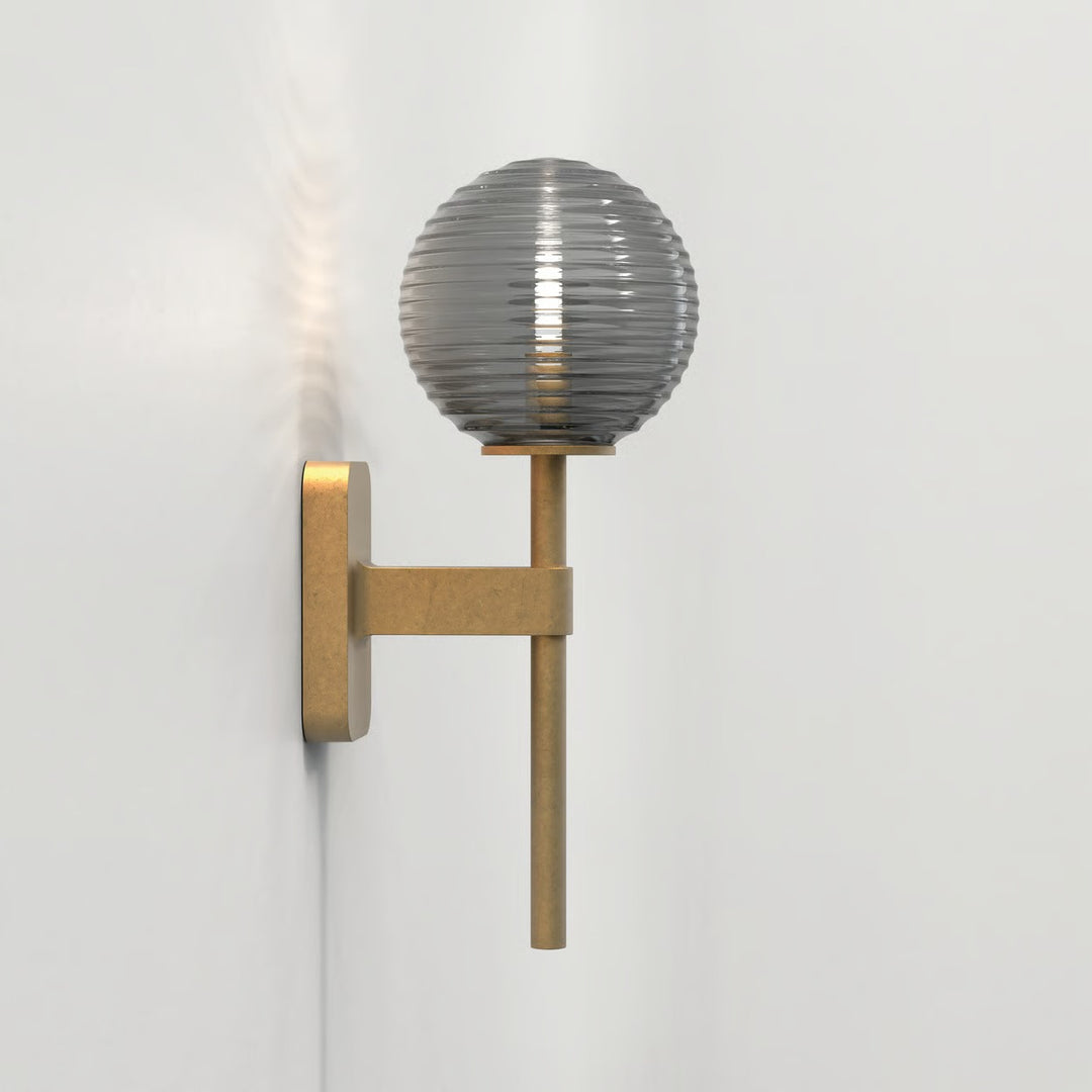 Astro Tacoma Single wall light in Antique Brass with ribbed glass shade